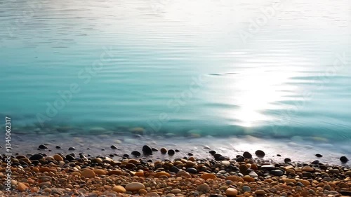 Serene Waterscape: Capture the mesmerizing dance of sunlight on tranquil water. This image transports you to a place of peace.