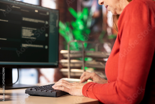 PC user interacting with an AI chat system on her computer at home office, highlighting the evolution of artificial intelligence. Woman employs chatbot services and digital tools for productivity.