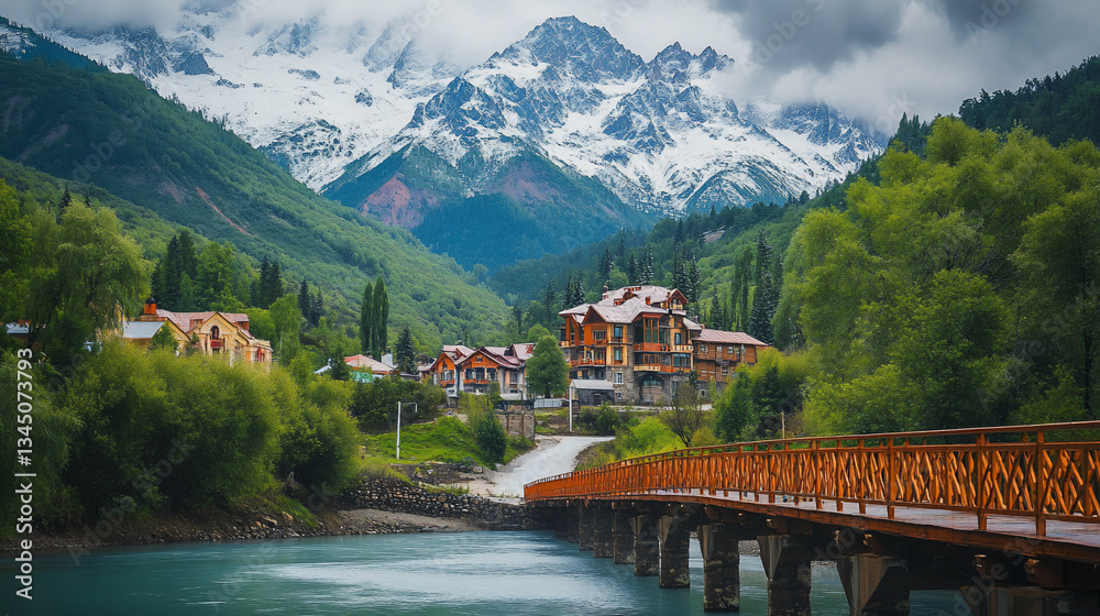 Obraz premium Mountain village scenic view with wooden bridge.