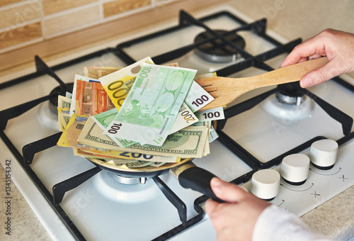 Conceptual Photo of Frying Money in a Pan