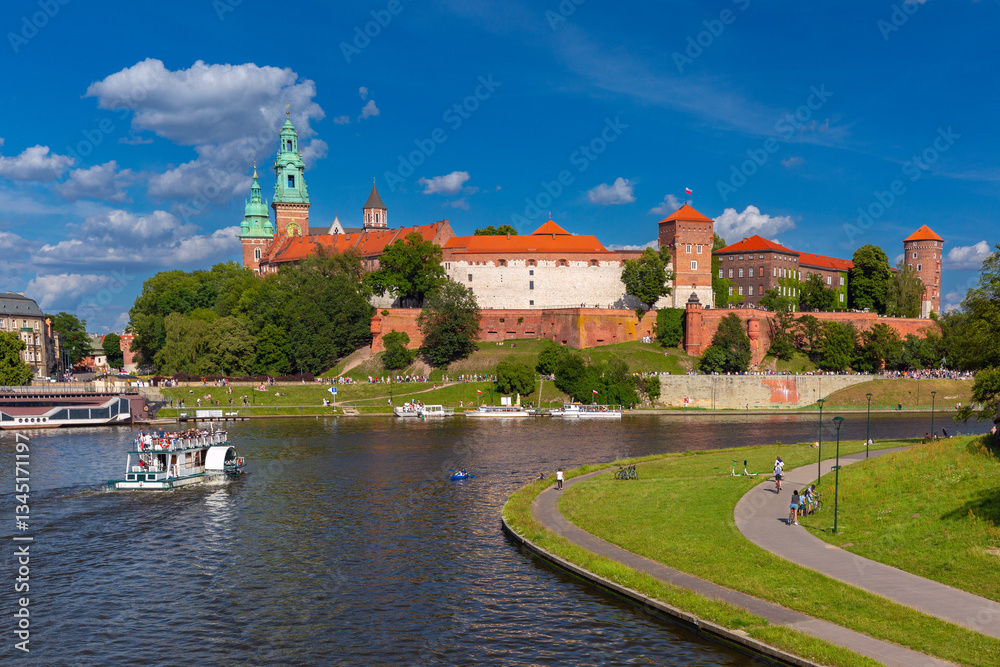 View of Wawel Castle in Krakow, Poland, with the Vistula River in the foreground