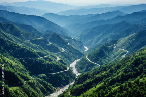 From high above, breathtaking aerial view unveils allure of a and untamed ravine, where a meandering river carves its way through towering precipices, evoking an exhilarating rush of excitement as one