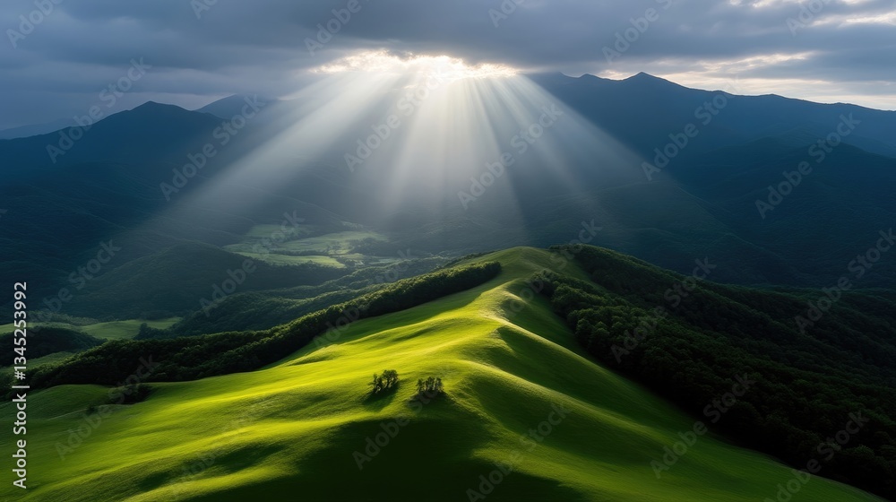 Fototapeta premium Majestic sun rays piercing through clouds over rolling hills. Lush green valleys and mountain ranges
