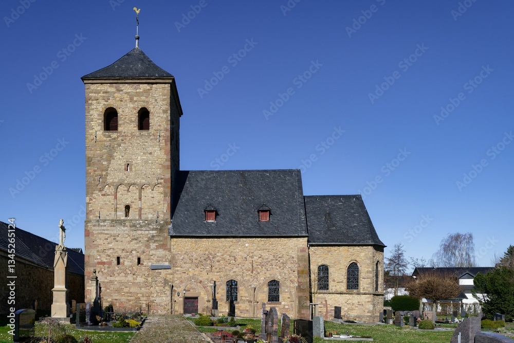 Fototapeta premium the old church in wollersheim with its late 11th century tower made of quarry stone masonry interspersed with the remains of roman bricks