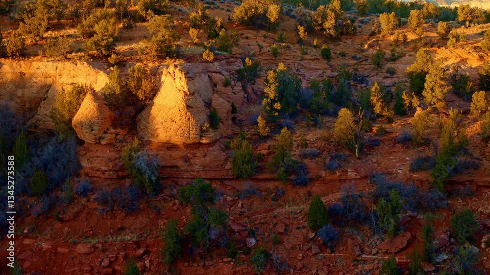The camera soars across a vast desert, unveiling an awe-inspiring view of canyons and mesas. The camera soars across a vast desert, unveiling an awe-inspiring view of canyons and mesas.