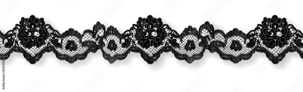 Obraz premium Black lace trim on a white background, flat lay