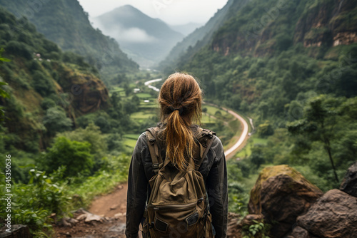 Embark on a captivating journey along a winding valley road, where shifting landscapes spark an eagerness for uncharted discoveries photo