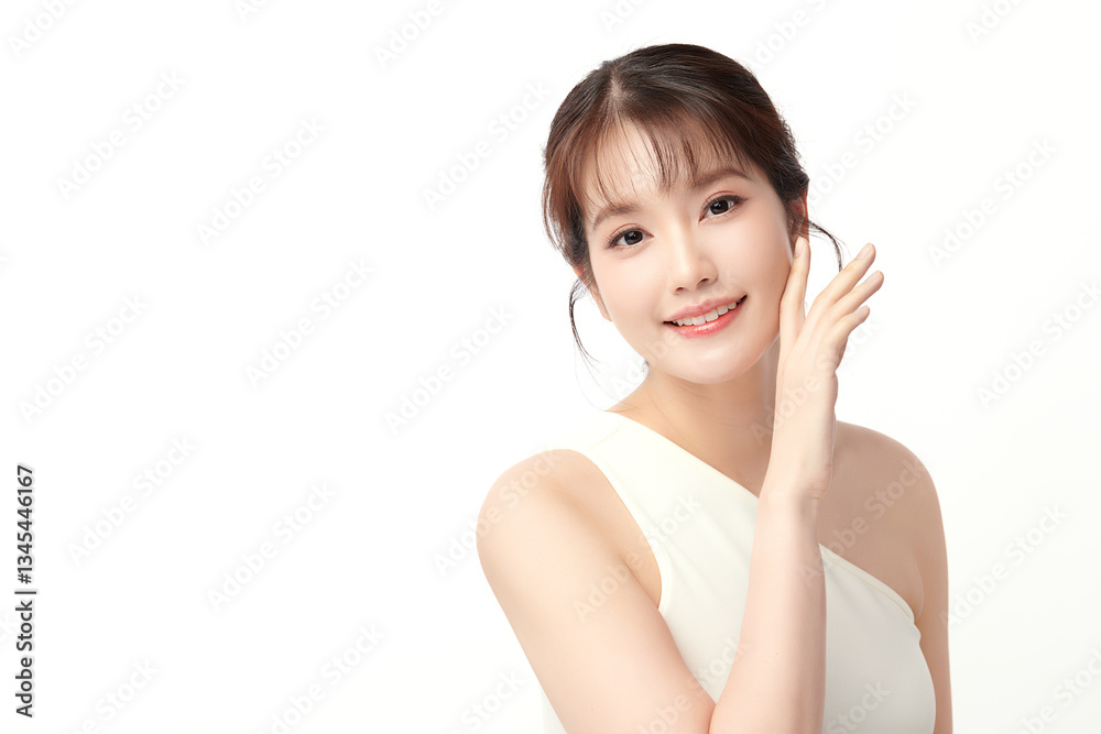 A beautiful young Asian woman with clean, fresh skin against a white background. Skincare, facial treatment, cosmetology, beauty, and spa. An elegant portrait of an Asian woman. A beautiful young Asian woman with clean, fresh skin against a white background. Skincare, facial treatment, cosmetology, beauty, and spa. An elegant portrait of an Asian woman.