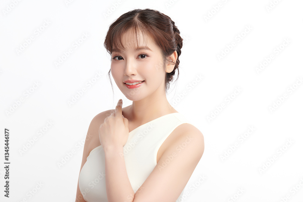 A beautiful young Asian woman with clean, fresh skin against a white background. Skincare, facial treatment, cosmetology, beauty, and spa. An elegant portrait of an Asian woman. A beautiful young Asian woman with clean, fresh skin against a white background. Skincare, facial treatment, cosmetology, beauty, and spa. An elegant portrait of an Asian woman.