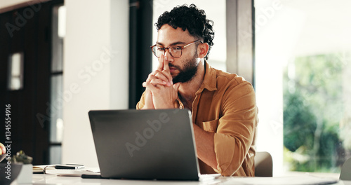 Laptop, thinking and man reading in home office for remote work, planning or journalist with story idea. Computer, creative freelancer and inspiration for article, problem solving or insight for news