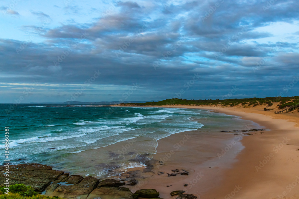 Sunrise seascape with strong southerly winds