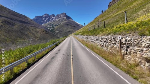 POV Driving on Going-to-the-Sun Road in Glacier National Park, Montana, with Mountain Views