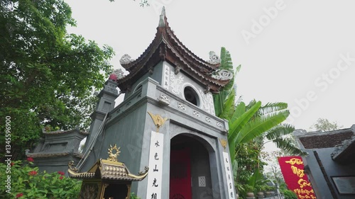 Moving towards the entrance of Ngoc Son Temple in Hanoi, Vietnam photo