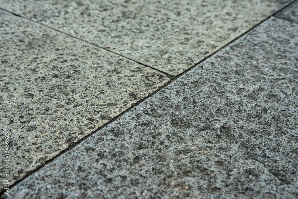 Obraz premium Rough stone tile background, tiles used for pedestrian sidewalk, suitable for design and background resource