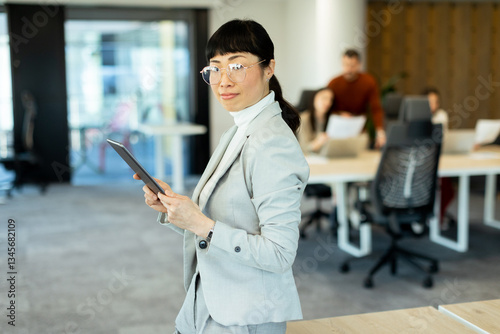 Asian businesswoman engaged...