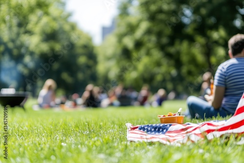 Fototapeta Naklejka Na Ścianę i Meble -  Festive celebration with food and friends in the park on a sunny day