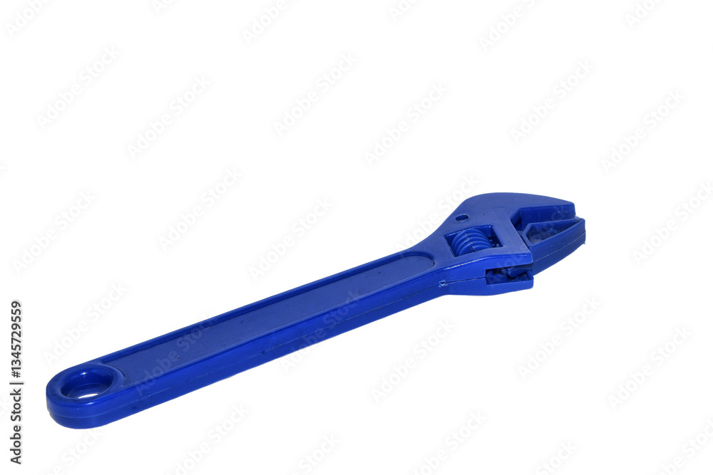 a plastic toy in the shape of a wrench a plastic toy in the shape of a wrench