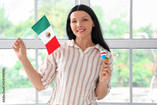 Young woman with Mexican fl...