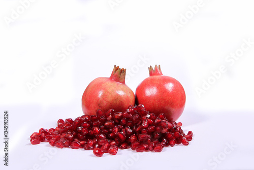 Fototapeta Naklejka Na Ścianę i Meble -  Pomegranates in white background 