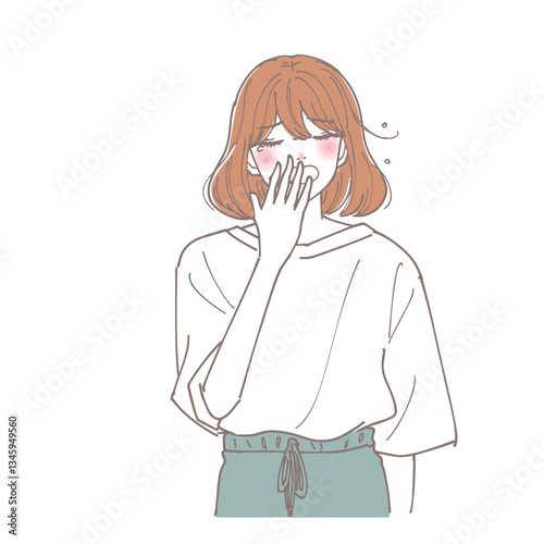 あくびしながら眠たそうにしている女性