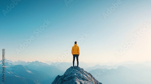 Wallpaper Mural Person looking out at the horizon from a mountain peak, ready for new challenges Torontodigital.ca