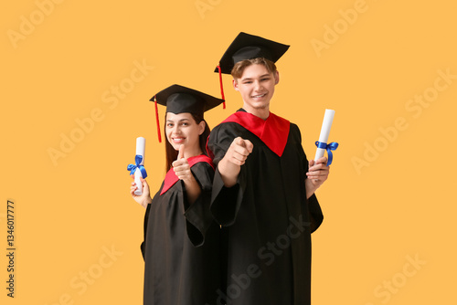 Happy graduate couple with ...