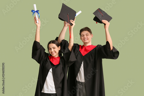 Happy graduate couple with ...