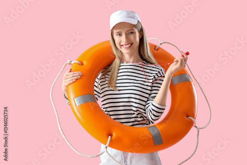 Young female lifeguard in c...
