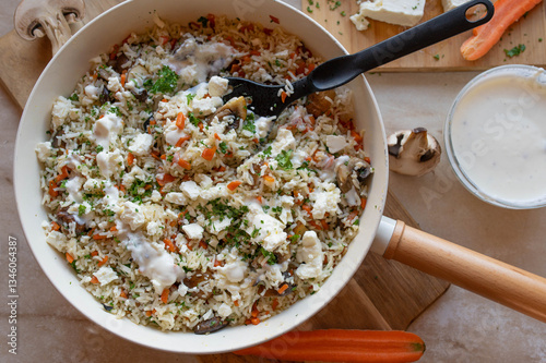 Obraz na płótnie Vegetarian pan dish with basmati rice, feta cheese, mushrooms and carrots. Healthy homemade food w salonie