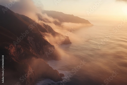 Misty sunrise over the rugged coastline of Big Sur, capturing nature's breathtaking beauty