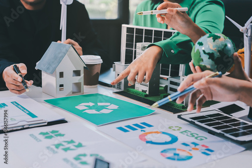 Young Asian business team discussion reusable product in office,start up eco-friendly business,environmental protection,sustainable business model,ESG strategy,team meeting,people work at home concept