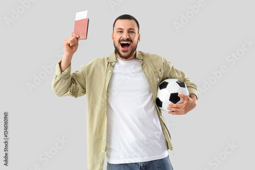 Happy male sport fan with p...