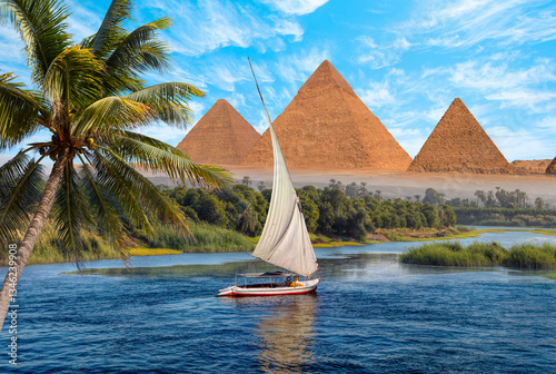 Slika na platnu Beautiful Nile scenery with traditional Felluca sailing boat in the Nile on the