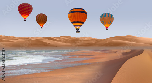 Hot air balloon flying over Namib desert with Atlantic ocean meets near Skeleton coast - Namibia, South Africa