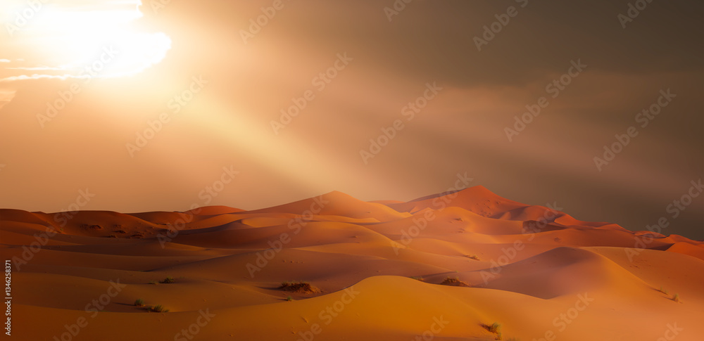 Sand dunes in the Sahara Desert at amazing sunrise, Merzouga, Morocco - Orange dunes in the desert of Morocco - Sahara desert, Morocco