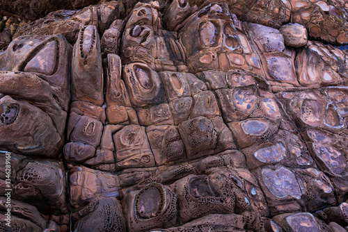Incredible erosion patterns on rocks along the shore, Thailand