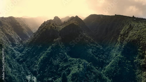 Spectacular aerial view flying over beautiful mountains at sunset on the island of La Palma in the Canary Islands