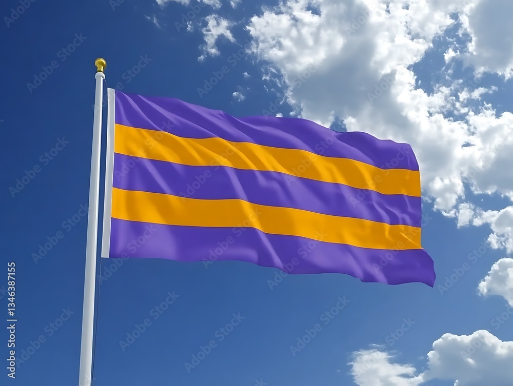 A purple and yellow striped flag blows in the breeze A purple and yellow striped flag blows in the breeze