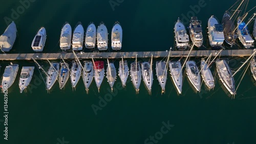 Top-Down Aerial View of Yachts and Sailboats Docked in a Marina