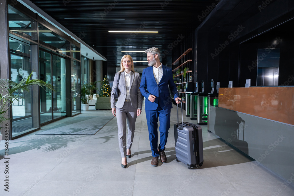 Fototapeta premium Business owner meeting a partner in the airport and going to the exit