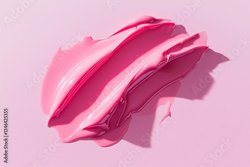 Texture pink cream gel cosmetic smudge on pink background, lipstick or blush or eye shadow or nail polish smudge trendy colore	
