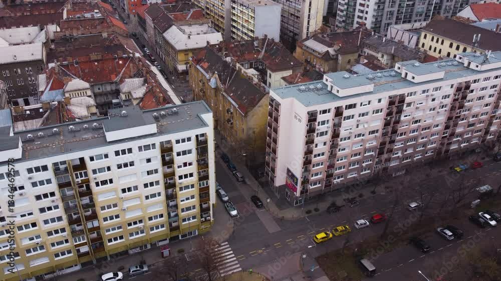 Aerial establishing Budapestwith weathered old buildings and surrounding districts along Danube River