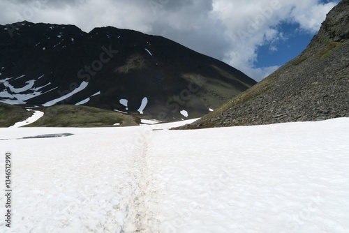 Mountains with lingering snow in midsummer, Crow Pass Trail, Anchorage, Alaska
