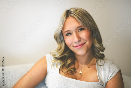 close portrait of teen in her bedroom in a house interior