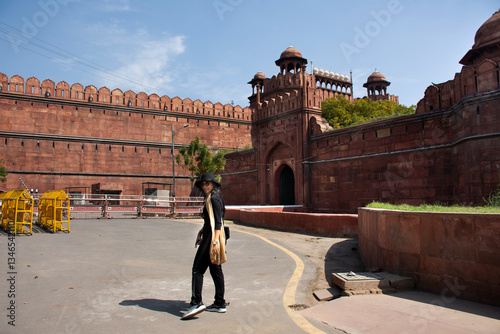 Photography Thai women journey visit and travel for take photo with Red Fort or Lal Qila of