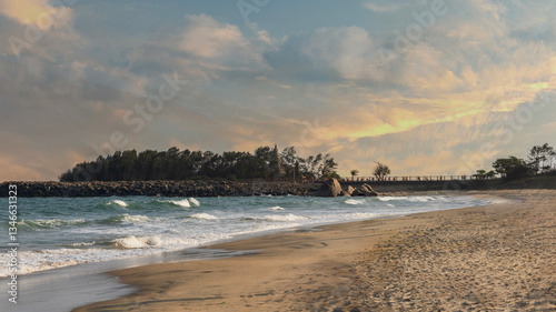 sunset on the beach at Mahabalipuram, Tamilnadu, India. The shore temple on the beach built by Pallava kings between 700 and 800 AD.