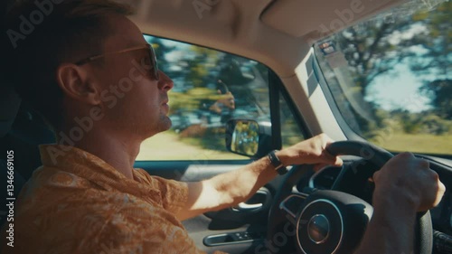 Wallpaper Mural Adult man steers the car on a highway Torontodigital.ca