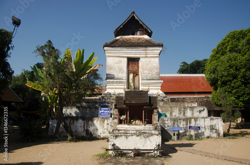 Ancient building for male people looking image chedi upside down from natural pinhole camera at Wat Phra That Lampang Luang