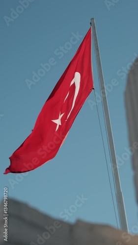 turkish flag against blue sky