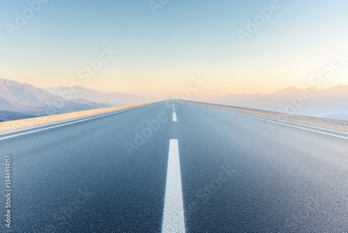 empty road under clear sky stretching into horizon with soft sunlight illuminating path symbolizing new journeys and